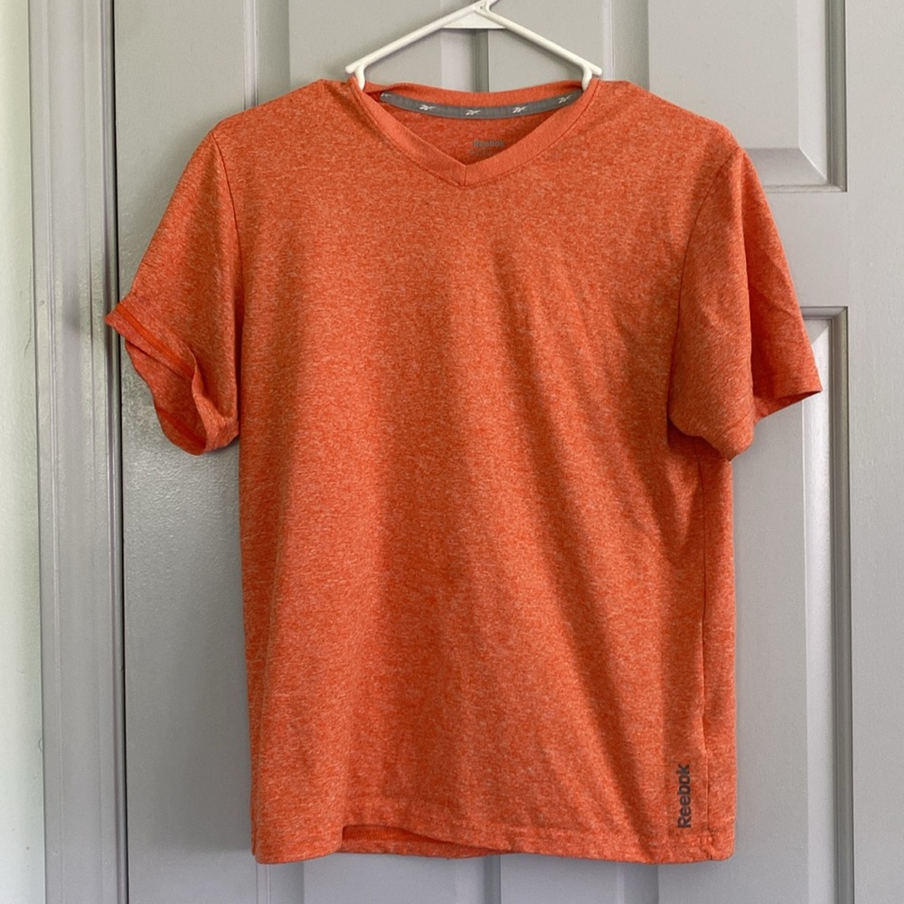 Women’s orange Reebok exercise top🧡